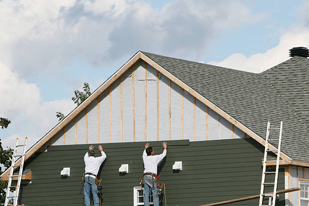 Professional Emergency Siding Repair technician working in Harrison, NJ